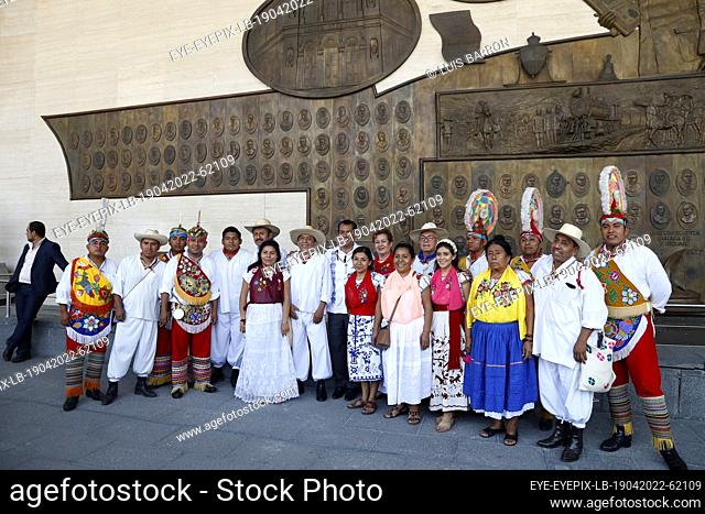 MEXICO CITY, MEXICO - APR 19, 2022: The president of the Chamber of Deputies, Sergio Gutierrez Luna, accompanied by members of the Totonacu people of the state...