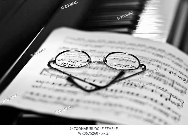 Glasses at sheet of music