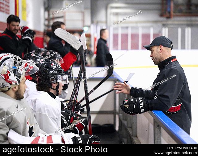 Alan Letang, the national team captain, gives instructions when Canada's team trains in Limhamns Ice Hall in Malmö, Sweden