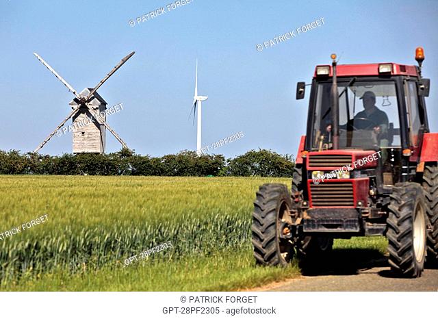 TRACTORS AND WHEAT FIELD, WIND TURBINES AND THE LEVESVILLE LA CHENARD WINDMILL, WIND PARK OF THE BEAUCE, EURE-ET-LOIRE 28, FRANCE