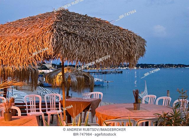 Beach restaurant at dusk, Juan les Pins between Cannes and Antibes, South of France, Europe