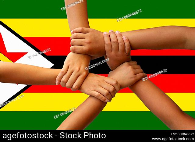 Zimbabwe flag, intergration of a multicultural group of young people