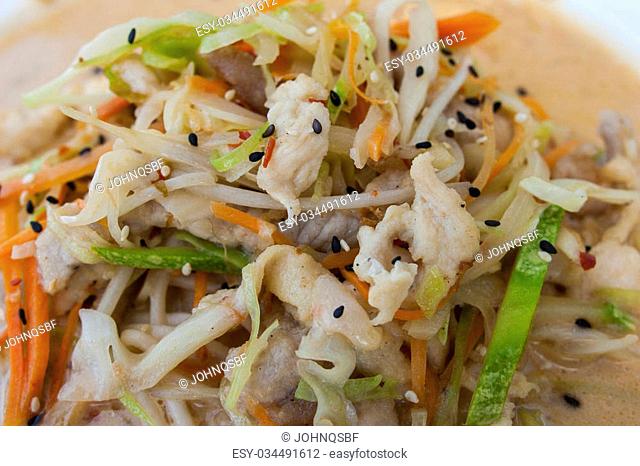 asian noodles soup with vegetables and beef and chicken