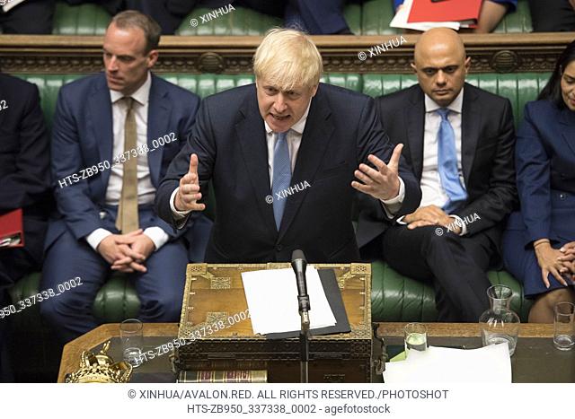 (190725) -- LONDON, July 25, 2019 (Xinhua) -- British Prime Minister Boris Johnson (front) makes his first statement in the House of Commons in London, Britain