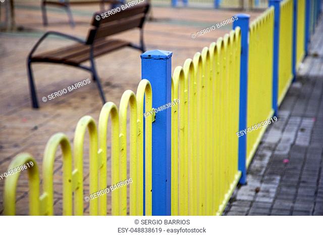 Yellow guardrail for protection, security detail