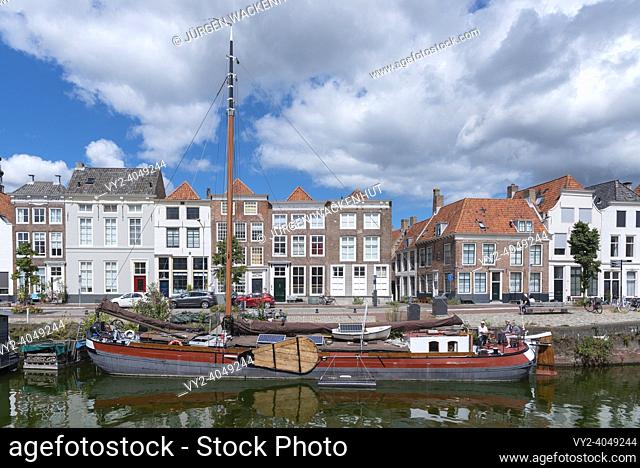Cityscape with traditional flat-bottomed sailing boats on the Bierkaai, , Middelburg, Zeeland, Netherlands, Europe