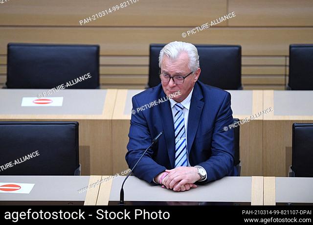 14 March 2021, Baden-Wuerttemberg, Stuttgart: Bernd Gögel, top candidate of the Afd, sits in the plenary hall after the first projections of the state elections...