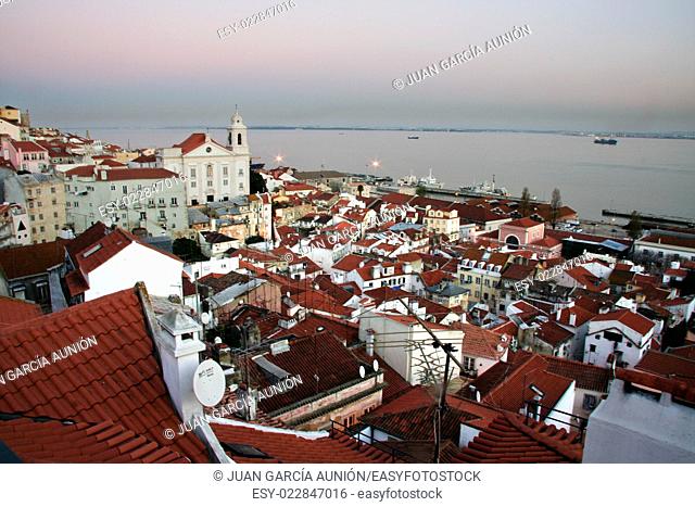Alfama district from the miradouro viewpoint in the central Lisbon at dusk, Portugal