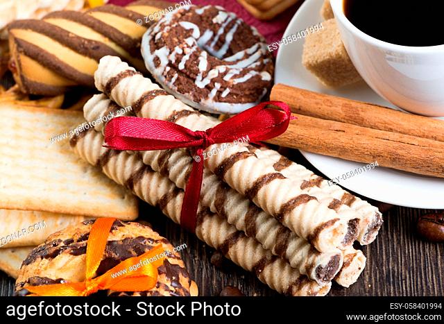 Cookies and biscuits for celebration on wooden table
