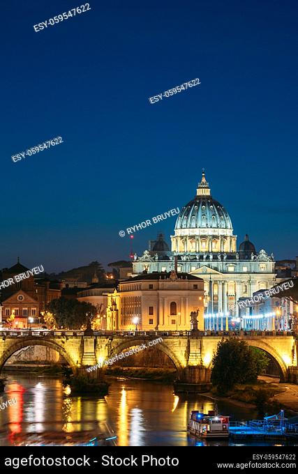 Rome, Italy. Papal Basilica Of St. Peter In The Vatican And Aelian Bridge In Evening Night Illuminations