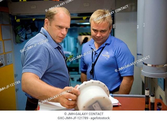Cosmonauts Oleg Kotov (left), Expedition 22 flight engineer and Expedition 23 commander; and Maxim Suraev, Expedition 2122 flight engineer