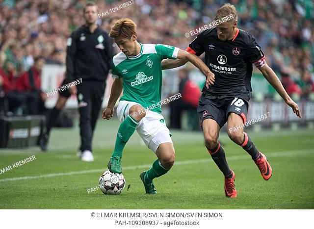 Yuya OSAKO (left, HB) versus Hanno BEHRENS (N), action, duels, football 1st Bundesliga, 1st matchday, Werder Bremen (HB) - FC Nuremberg (N) 1: 1, on 16