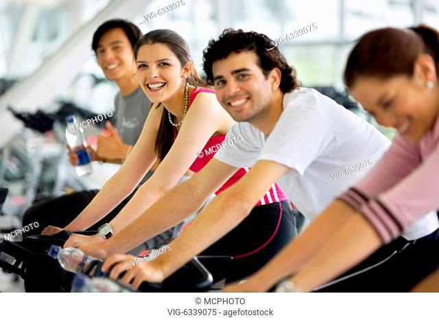 group of people doing spinning at the gym - 16/10/2008