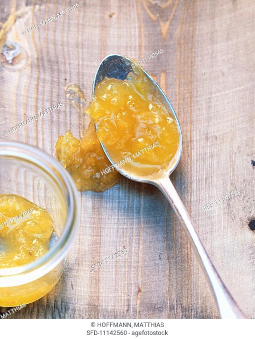 Pineapple and fennel jam on a spoon and in a jar