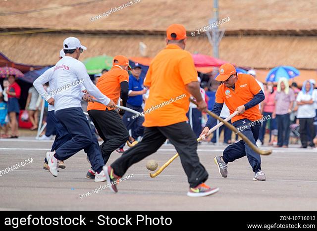 a Game of the traditional Hockey Tikhy or Lao Hockey at a ceremony at the Pha That Luang Festival in the city of vientiane in Laos in the southeastasia