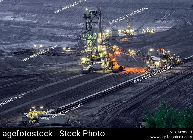 Germany, Lower Saxony, Schöningen, spreader in the former open-cast lignite mine Schöningen