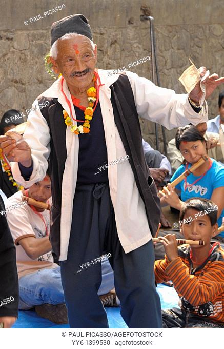 man dancing , family gathering, the nepalis , life in kathmandu , kathmandu street life , Nepal