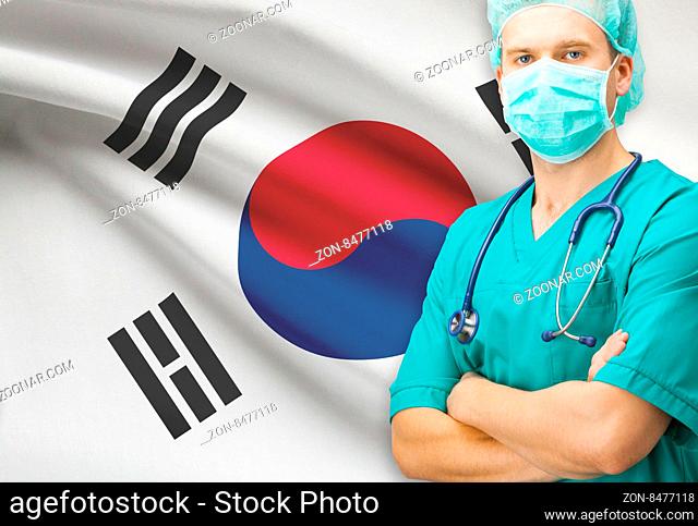 Surgeon with national flag on background - South Korea