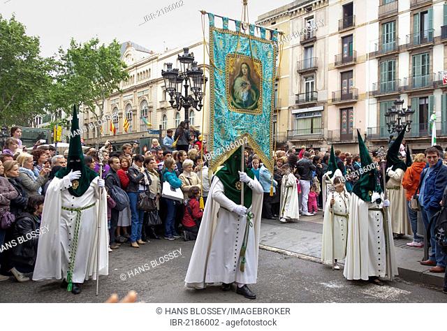 Penitents with crosses at the Semana Santa procession, Holy Week, Barcelona, Catalonia, Spain, Europe