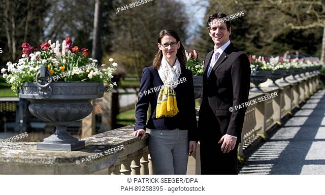 Bjoern, Count of Bernadotte and Bettina Countess of Bernadotte pose in front of flowers on the island Mainau, Germany, 23 March 2017