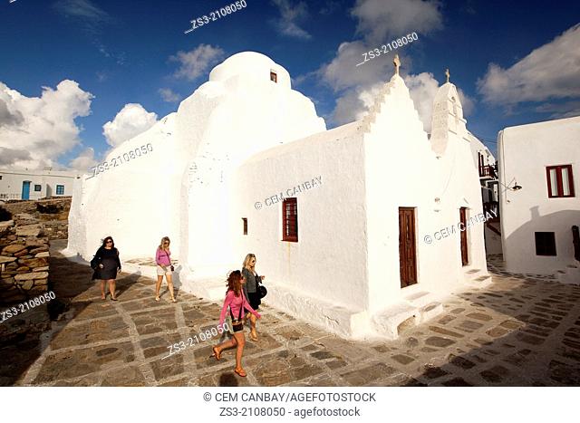 Tourists walking around the Paraportiani Church, Mykonos, Cyclades Islands, Greek Islands, Greece, Europe