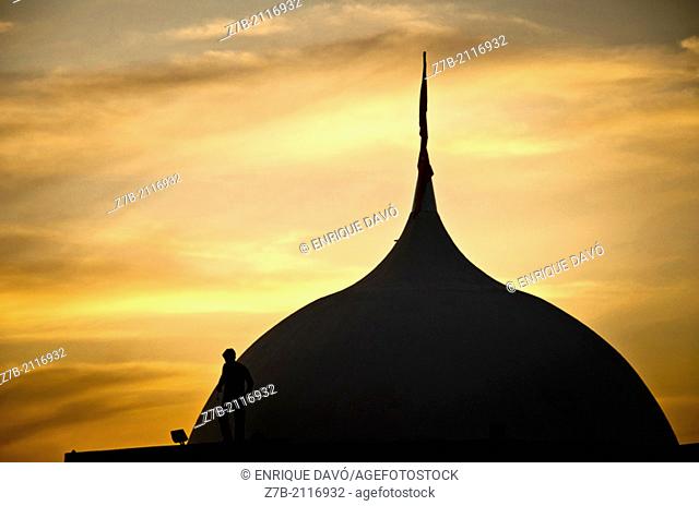 A dome in Castilla region in a evening with a silhouelette of a man