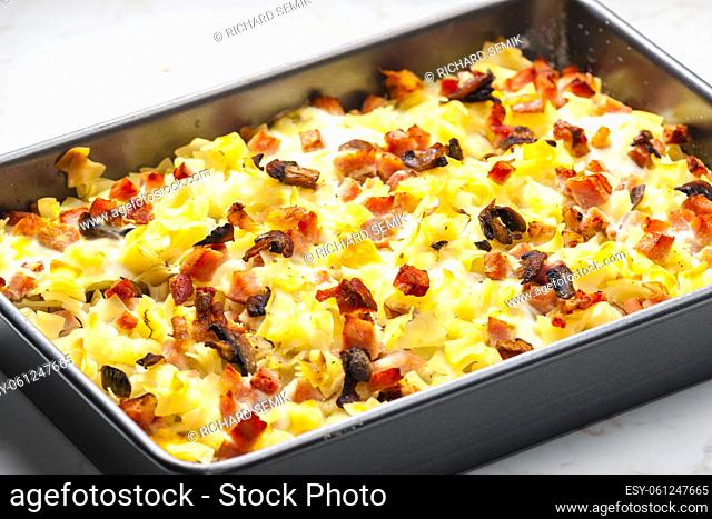 baked pasta with smoked meat and eggs