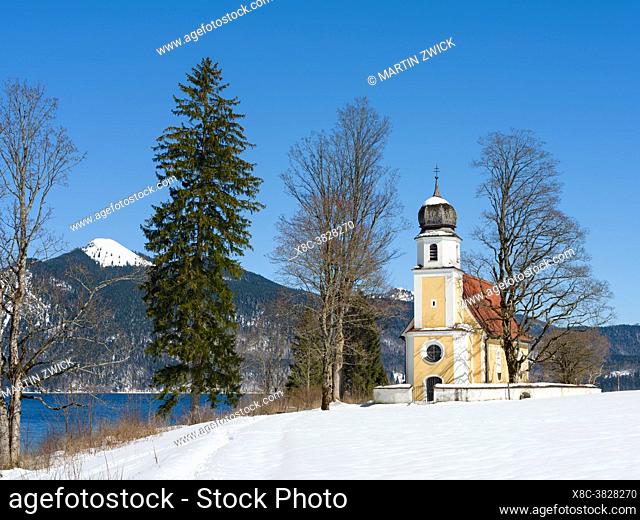 Church Sankt Margareth at Zwergern Spitz. Lake Walchensee near village Einsiedl in the snowy bavarian Alps. Europe Germany, Bavaria