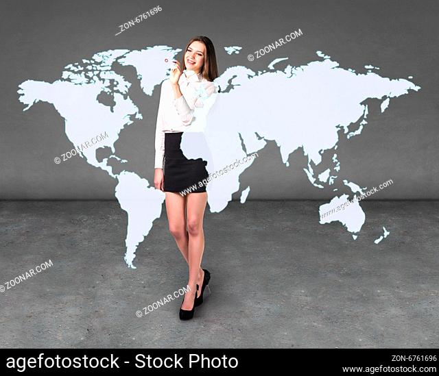 Business woman draw a point on a virtual map, a global business