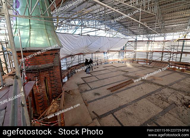 PRODUCTION - 03 January 2023, Mecklenburg-Western Pomerania, Rostock: Only one of the original seven copper-covered turrets still stands on the roof of the...
