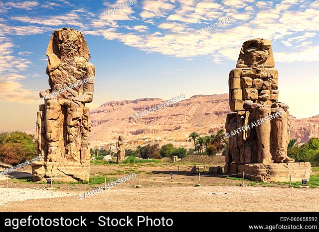 The Colossi of Memnon statues of the Pharaoh Amenhotep, Theban Necropolis, Luxor, Egypt