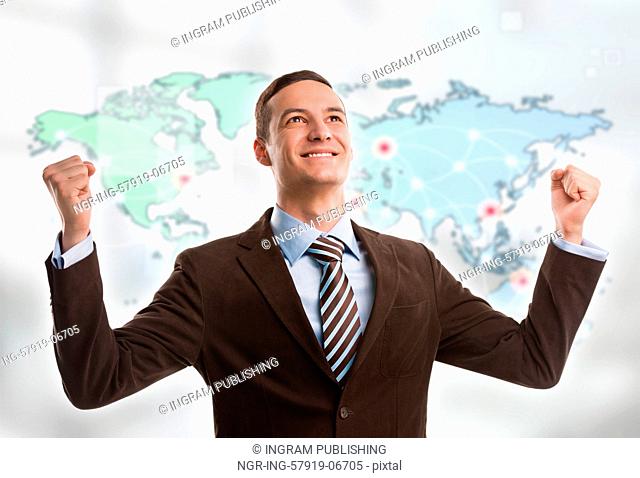 Portrait of young man standing in front of big world map. Server locations and actual online connections are displayed on virtual map
