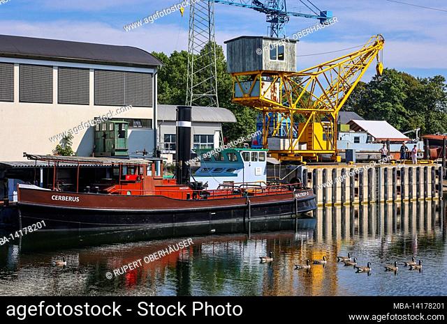 Waltrop, North Rhine-Westphalia, Germany, ship lift and lock park Waltrop. Here the 100 year old ship Cerberus at the harbor quay in the Oberwasser LWL...