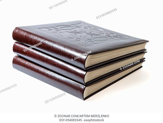different sizes albums and books on a white background