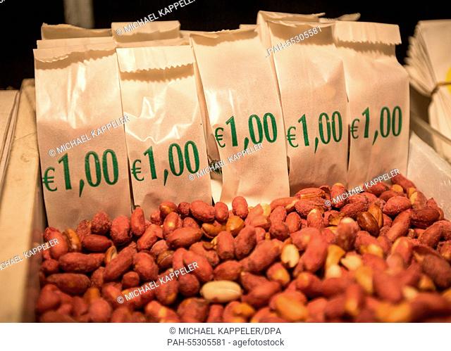 Red salted peanuts are on sale for one Euro after the initial election results for Greece general elections in Athens, 25 January 2015