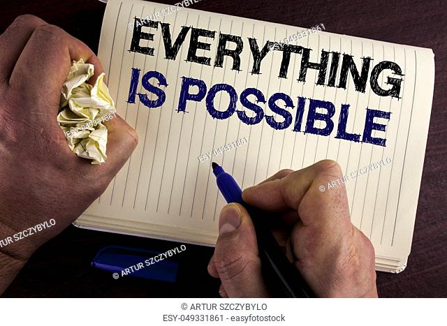 Writing note showing Everything Is Possible. Business photo showcasing All you think or dream can become true Optimistic written by Man Notebook Book wooden...