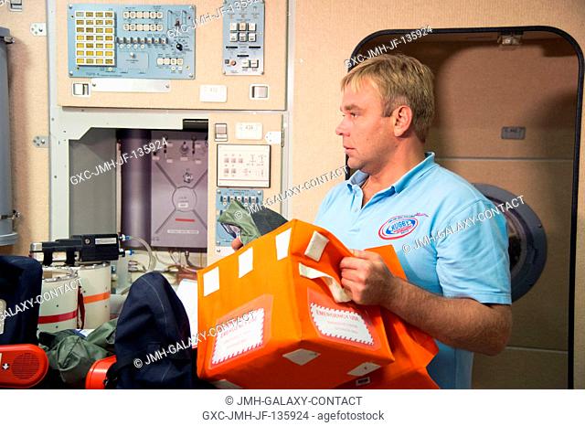 Russian cosmonaut Maxim Suraev, Expedition 40 flight engineer and Expedition 41 commander, participates in an emergency scenario training session in an...