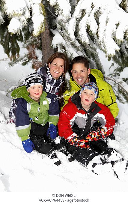 Family in snow at Silver Star Provincial Park, near Vernon, Okanagan, British Columbia, Canada