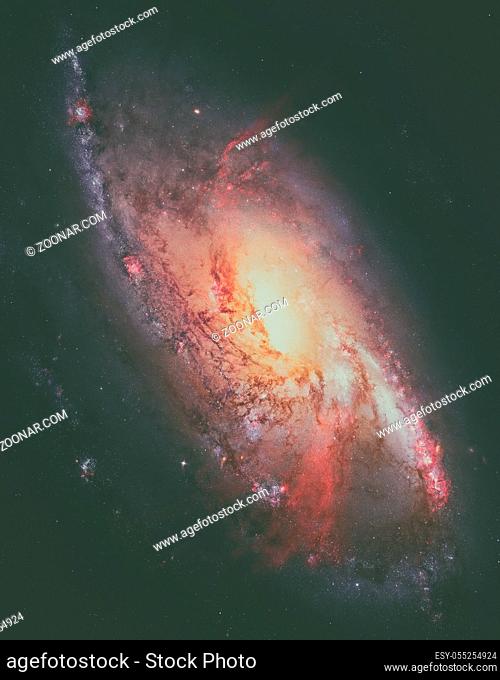M106, Spiral Galaxy. Also known as NGC 4258, M106 lies 23.5 million light-years away, in the constellation Canes Venatici