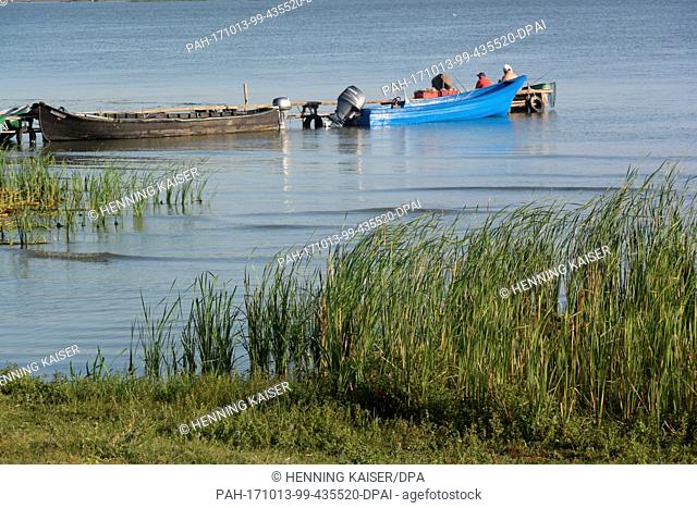 Men fish near Sfantu Gheorghe in the Danube delta, Romania, 19 August 2017...Â· NO WIRE SERVICE Â· Photo: Henning Kaiser/dpa