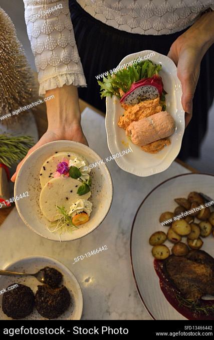 Woman serving Christmas hors d'oeuvres