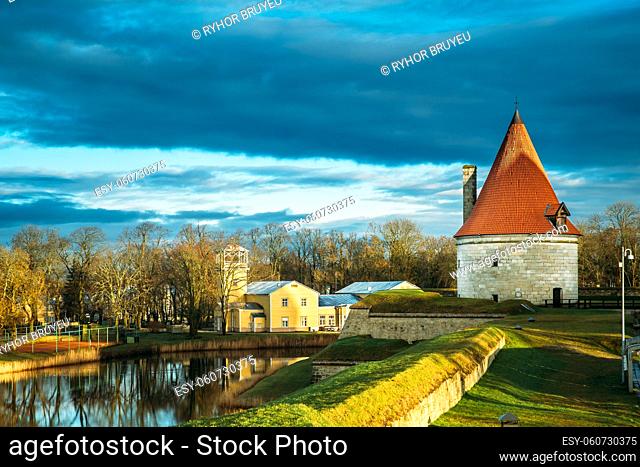 Kuressaare, Saaremaa, Estonia. Cannon Tower On Territory Of Episcopal Castle In Sunset. Traditional Medieval Architecture, Famous Attraction Landmark