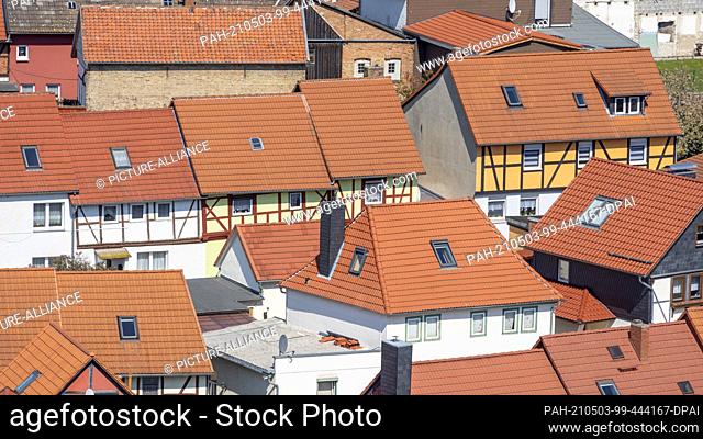 28 April 2021, Saxony-Anhalt, Halberstadt: Half-timbered houses stand in Langenstein in the Harz Mountains. Photo: Stephan Schulz/dpa-Zentralbild/ZB