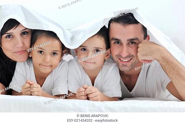 happy young Family in their bedroom