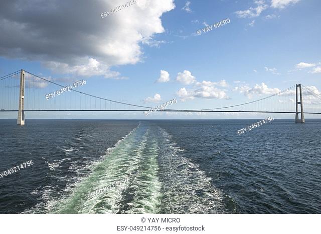 crossing the Suspension bridge Great Belt Denmark connecting the Zealand and Funen with a boat