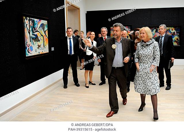 Director of the Lenbachhaus Helmut Friedel (L) leads a tour of the newly renovated Lenbachhaus with German Education Minister Johanna Wanka in Munich,  Germany