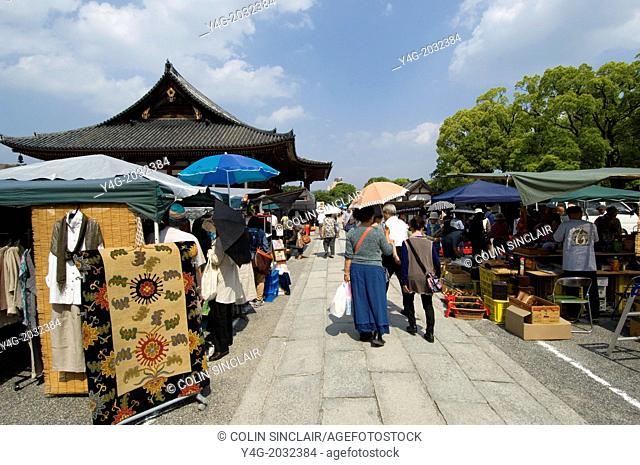 Toji temple, Antiques, Flea market, Browsers, Tourists, Stalls, Temple building, Kyoto, Japan, Locals, Buddhism, Locals, Parasols