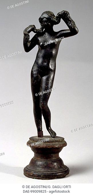 Bronze statuette of Venus Anadiomene, from Volubilis, Morocco. Roman Civilisation, 2nd century.  Rabat, Musée Archéologique (Archaeological Museum)
