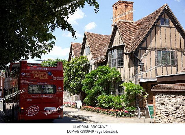 A sightseeing tour bus outside Hall's Croft, once the home of Shakespeare's daughter Susanna who married Doctor John Hall in 1607 after whom the house is named