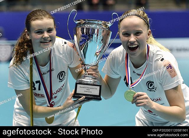 L-R Julia Croneld and Lisa Carlsson (both Taby) hold the cup after win of the IFF Floorball Champions Cup 2020, women's final match between Taby FC (Sweden) and...